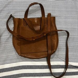 Brown Leather Crossbody with Adjustable Strap and Unique Shape